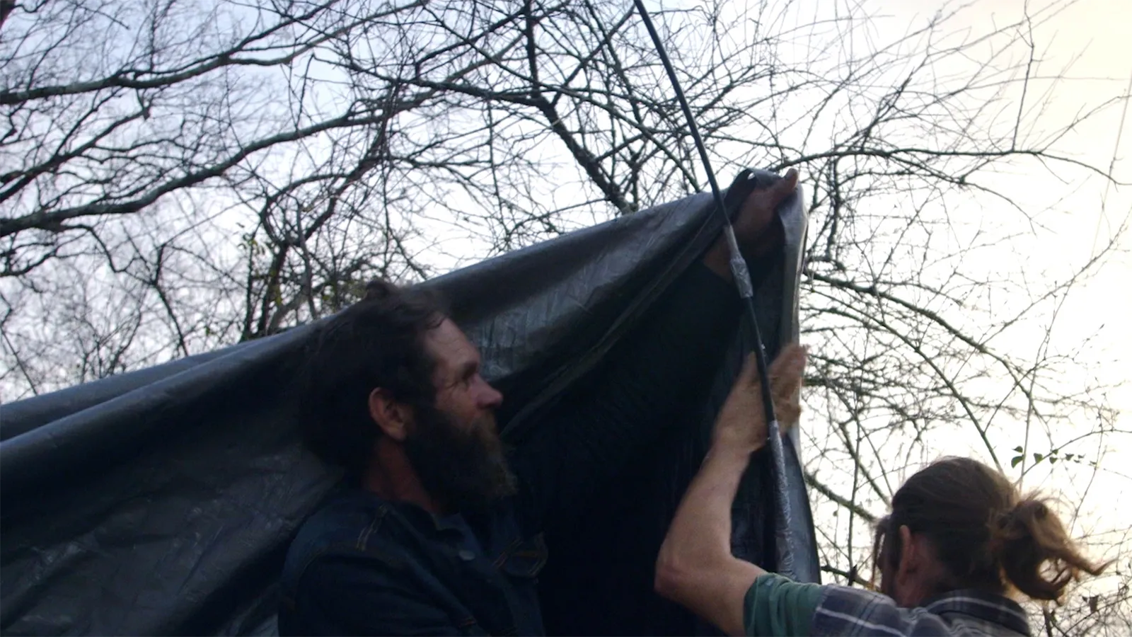 Chris Scott raising a tent at Ft. Negley in Nashville