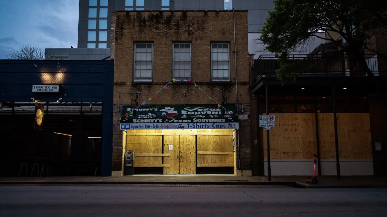 Shuttered businesses in Austin during the early days of the COVID-19 pandemic in March.