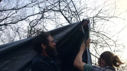 Chris Scott raising a tent at Ft. Negley in Nashville