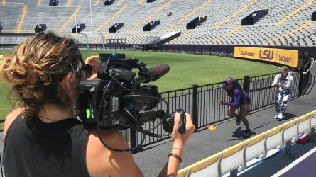 Meg Shutzer filming athlete AJ Andrews
